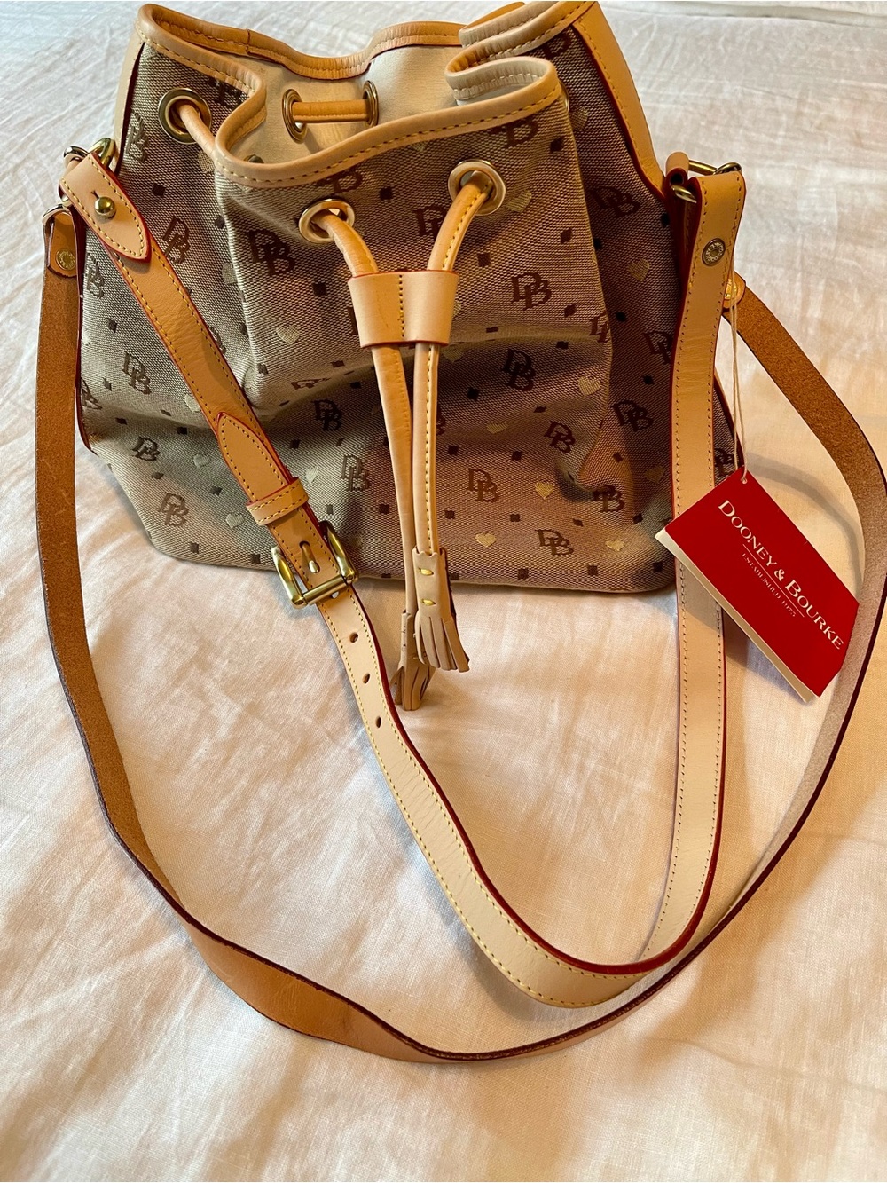 Dooney & Bourke Tan Monogram Drawstring Bucket Bag with Leather Trim